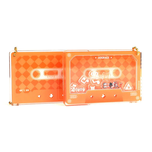 Orange acrylic cassette tape keychain with anime design, perfect for anime merch collectors