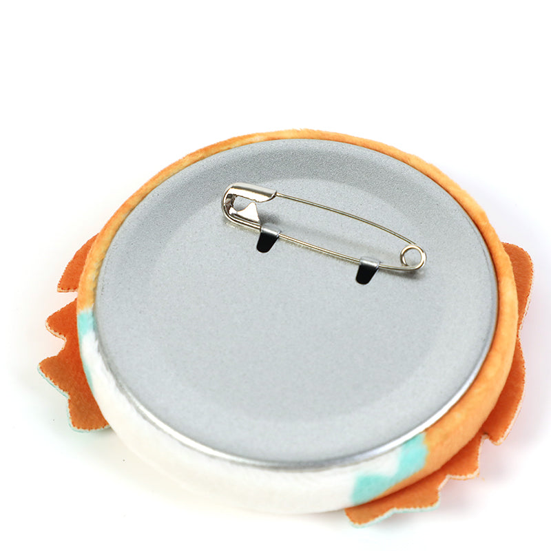 Back view of custom 3D plush head button pin with metal safety pin clasp