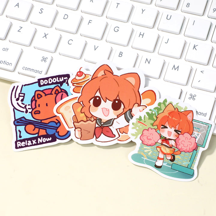Custom coated paper stickers with cute anime characters on a keyboard background