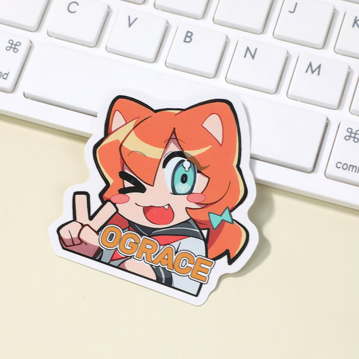 Anime character custom coated paper sticker beside white keyboard, colorful design