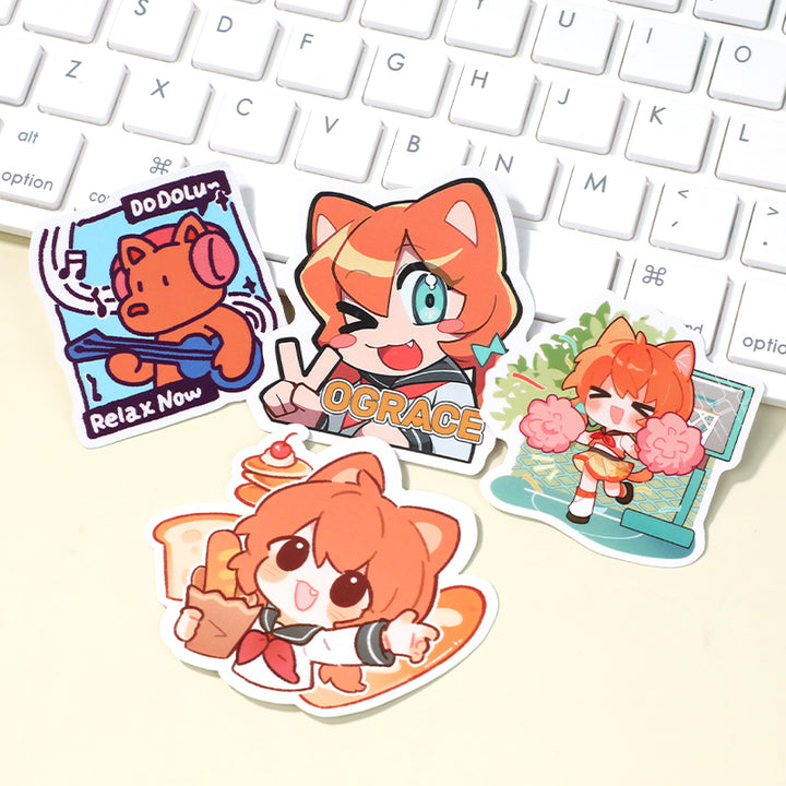 Cute custom coated paper stickers with anime-style characters on a white keyboard background