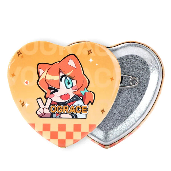 Heart-shaped custom button pin with orange anime cat character and metal backing