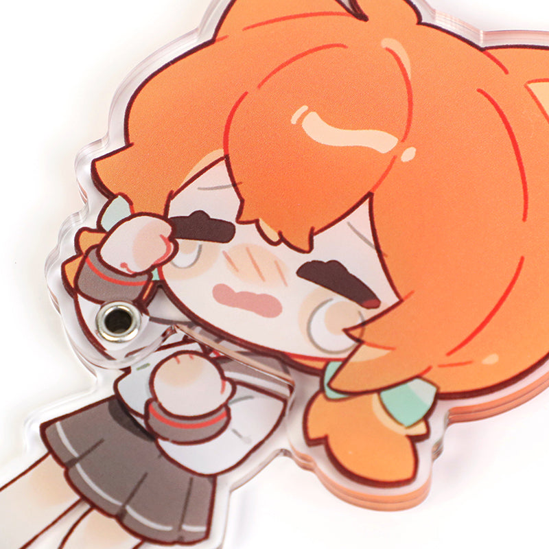 Custom multi-layer acrylic keychain featuring cute anime girl with orange hair and sad expression