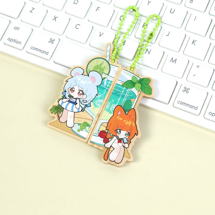 Custom wooden magnetic keychains with cute anime characters on a keyboard