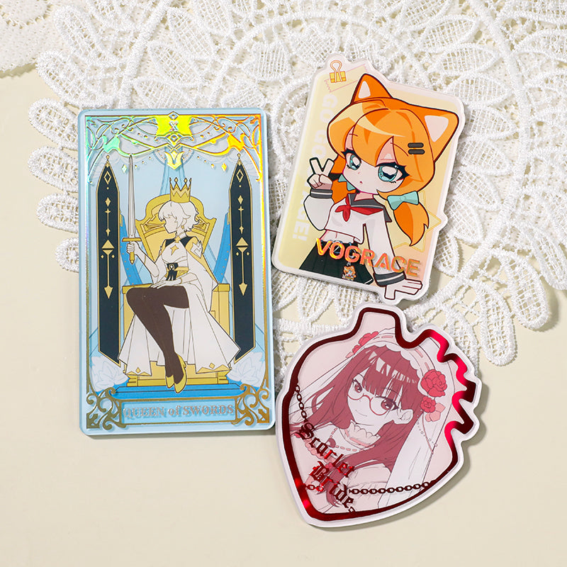 Custom acrylic fridge magnets with anime and queen card designs on white lace background