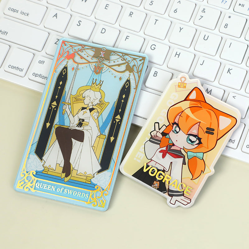 Custom acrylic fridge magnets with anime and tarot card designs on a keyboard background.