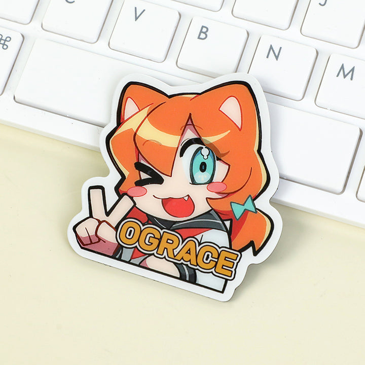 Custom anime acrylic fridge magnet with orange-haired cartoon character on a white keyboard
