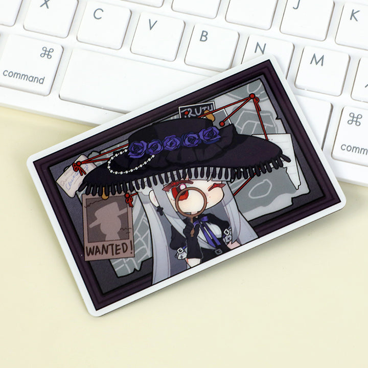 Custom acrylic fridge magnet featuring anime detective character near keyboard
