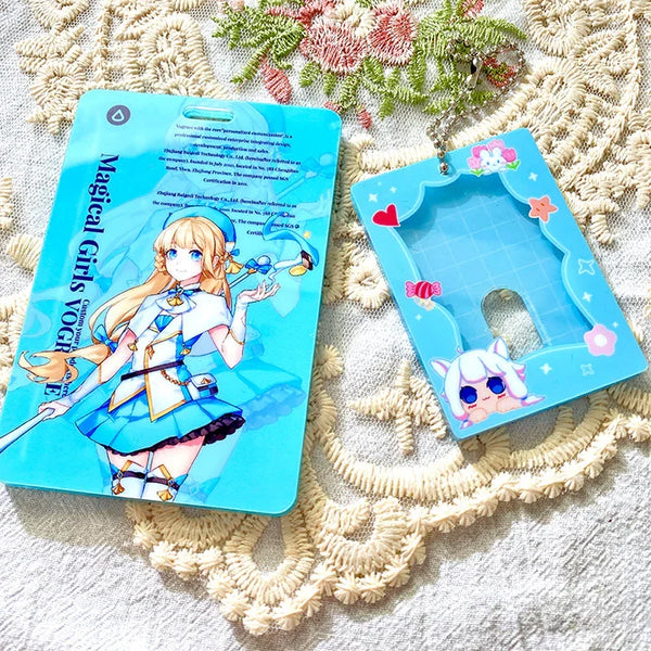 Custom acrylic photocard holder keychains with anime character designs and pastel decorations